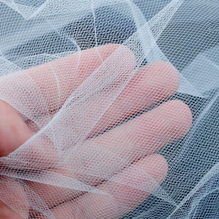 White veil attached to comb, ideal for loose hairdos or buns