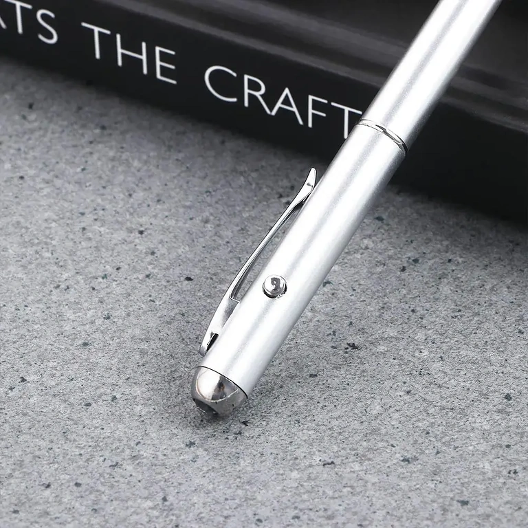 Silver pen with integrated light for messages appearing in the dark