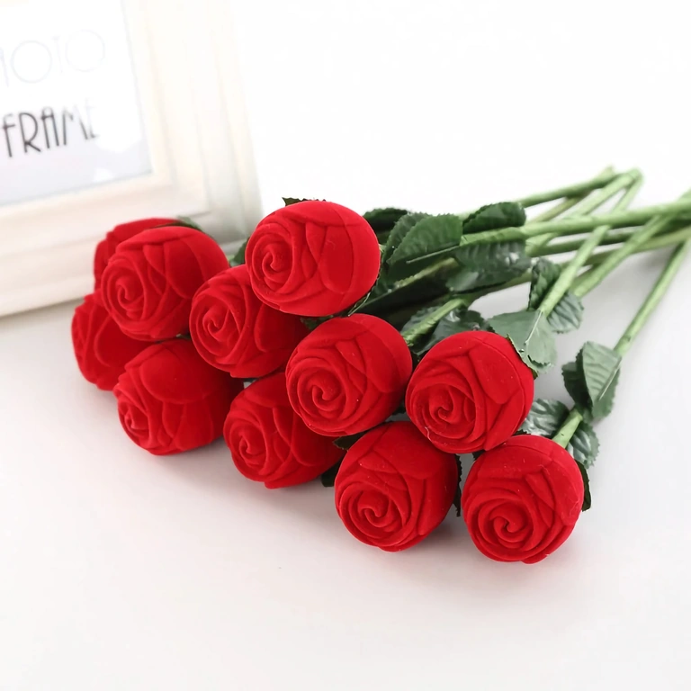 Red flower-shaped box for presenting a ring
