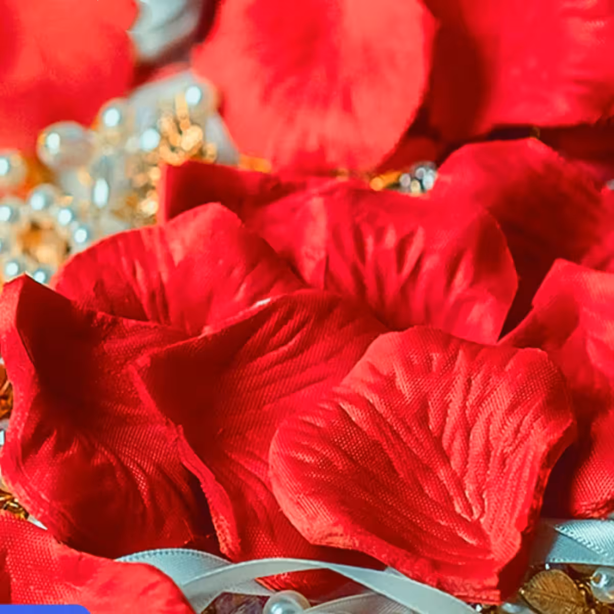 Red artificial rose petals for anniversaries and special occasions