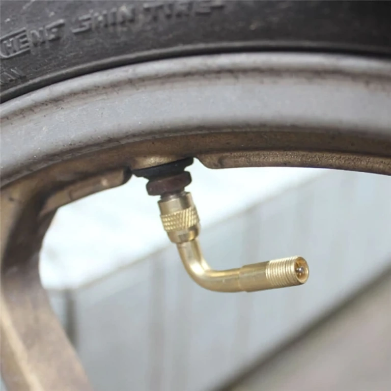 Angled extension for easy wheel inflation