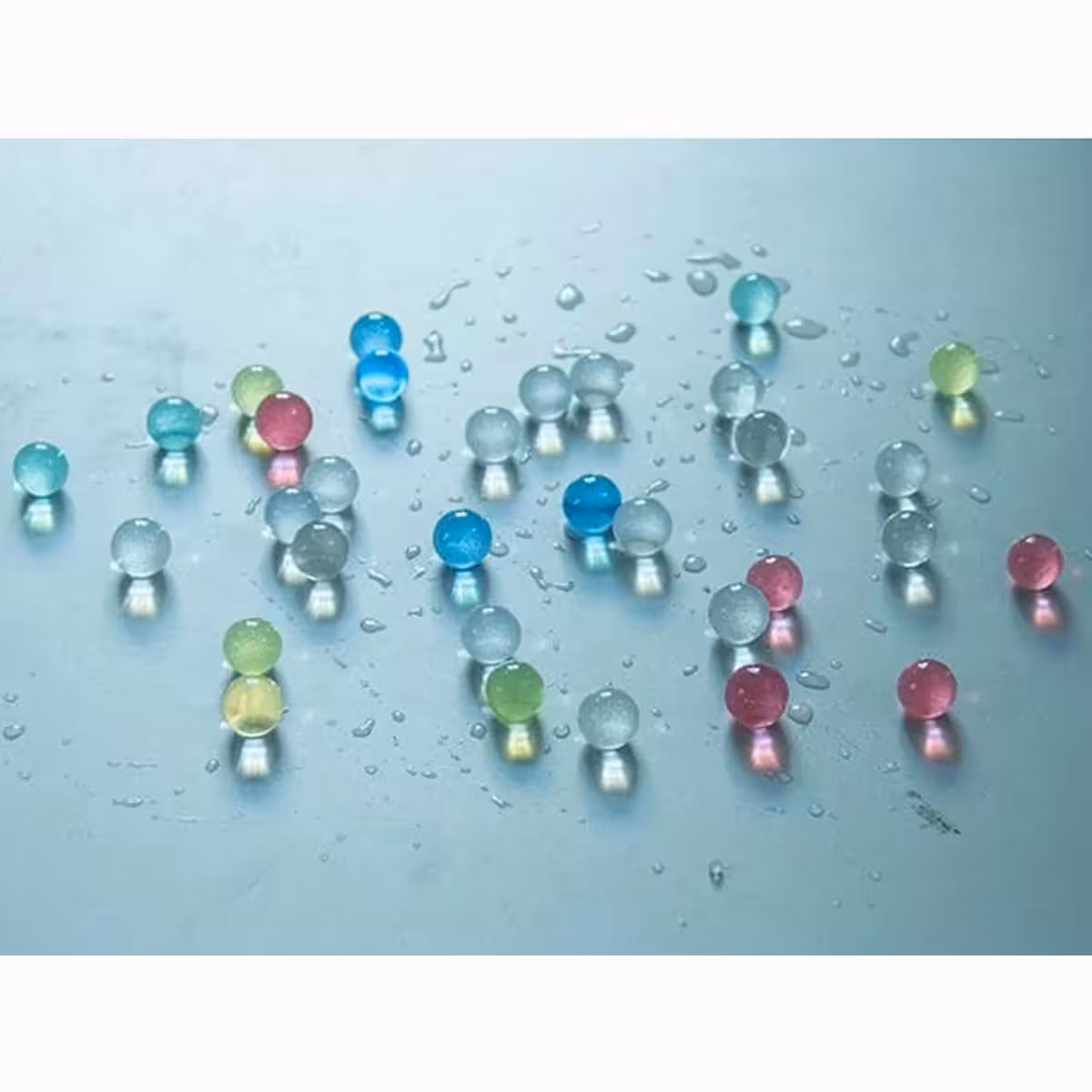 Colored ORBEEZ gel beads for vase decoration and flower arrangements