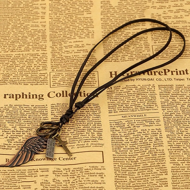 Cross pendant on black leather chain for men