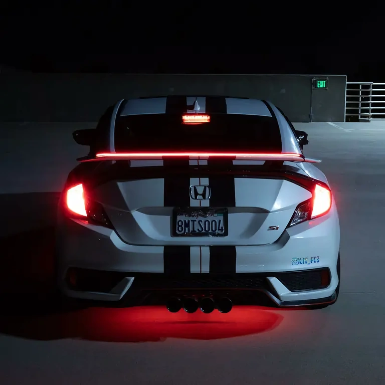 Trunk spoiler with carbon LED strip Trunk spoiler with LED strip and integrated brake light