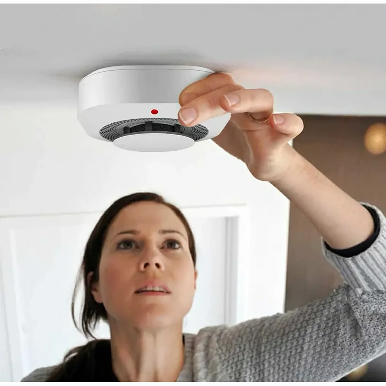 Smart smoke sensor with sound alert Smoke detector with loud alarm and app monitoring