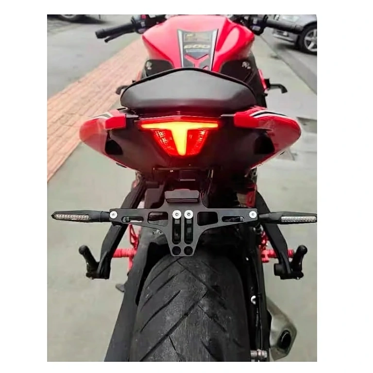 Sport motorcycle license plate holder with integrated LED