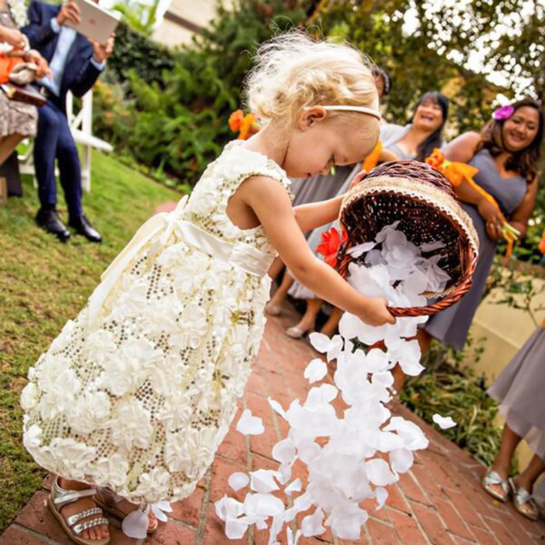 Artificial white petals used for wedding aisle decoration