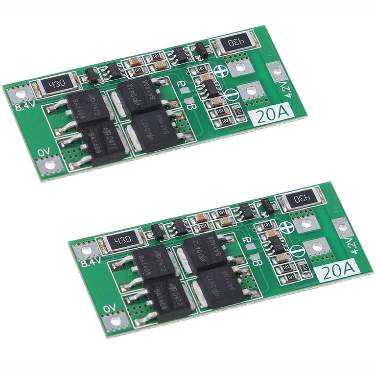 Two BMS 2S 20A Modules Photographed at an Angle to Highlight Electronic Components